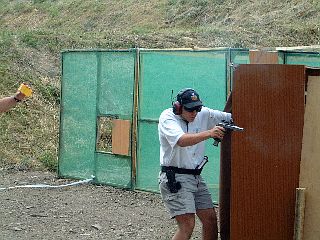 Remy opens the door during shooting with strong hand